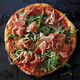 Pizza con rucola e prosciutto di Parma