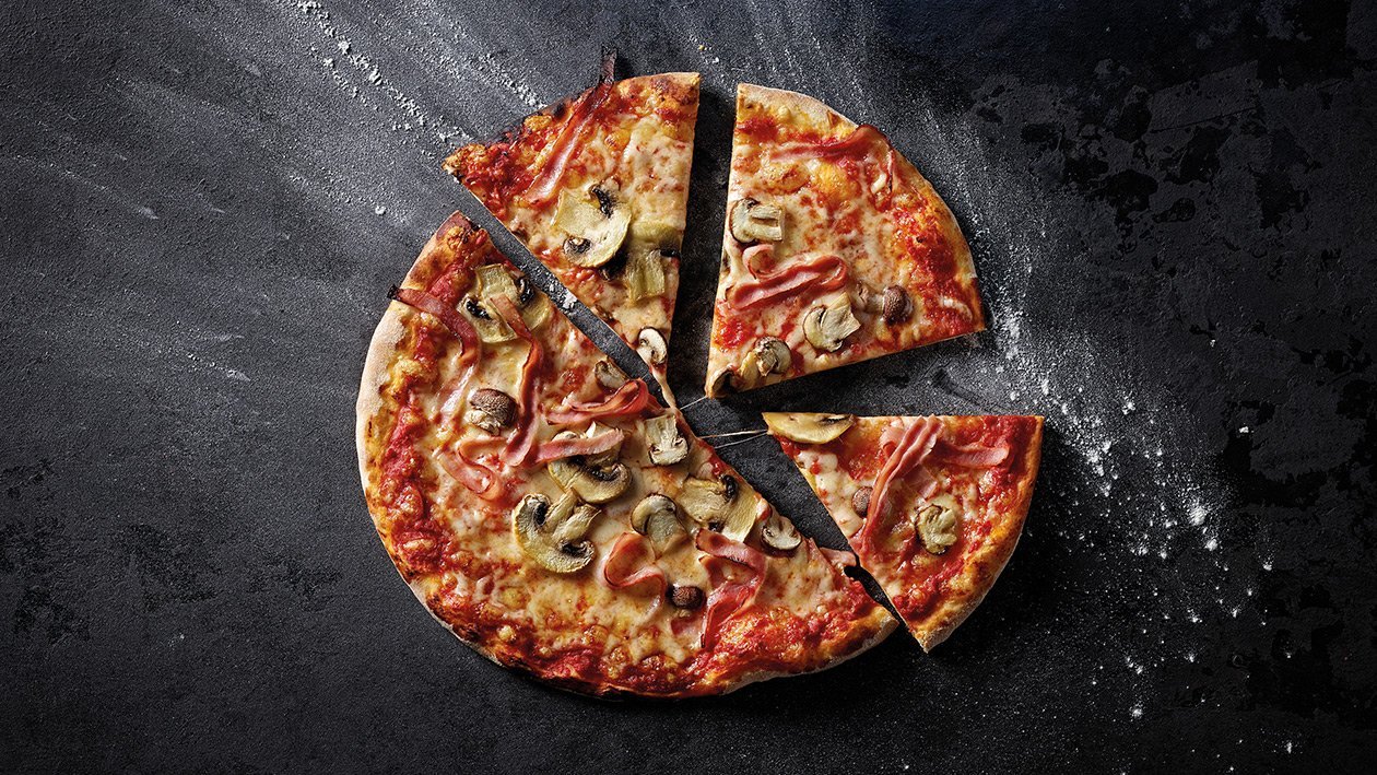 Pizza prosciutto e funghi –  