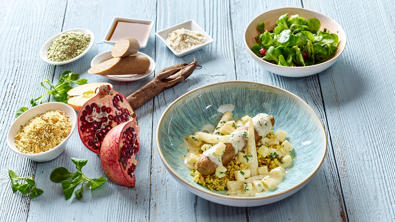 Vegi Bratwurst auf Bulgur &amp; Feldsalat mit Granatapfelkernen