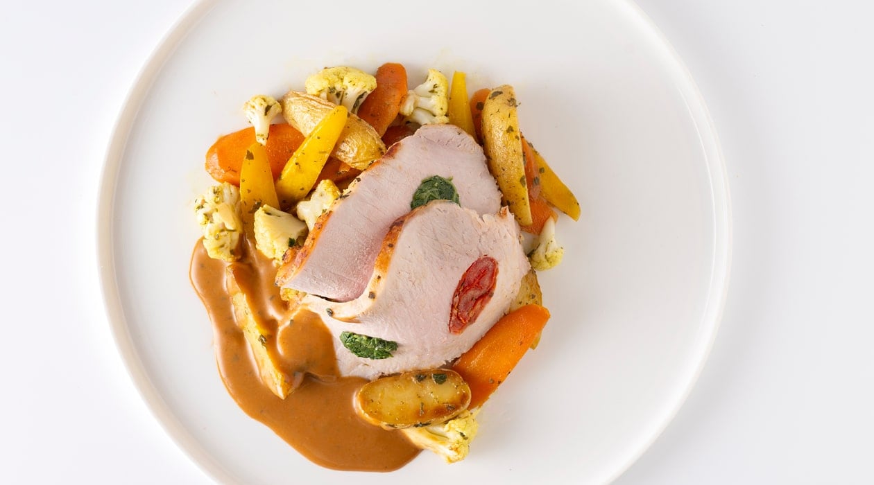 Italienischer Schweinebraten mit gegrilltem Gemüse und Babykartoffeln